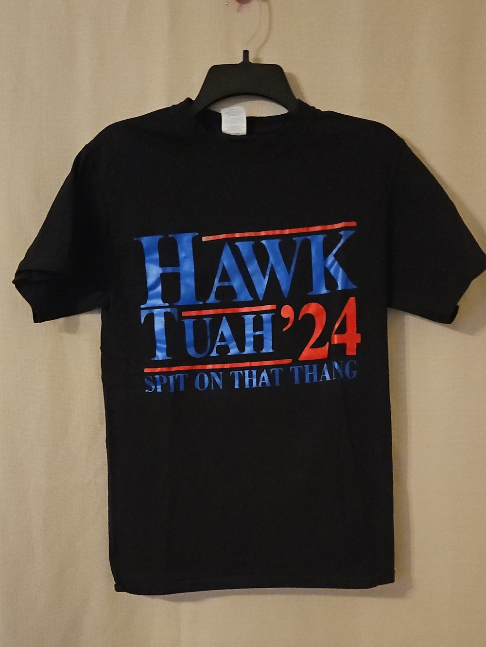 Black Short-Sleeve Graphic Tee with Blue and Red 'HAWK TUAH '24' Print